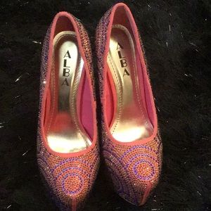 Alba pink bling platform heels.